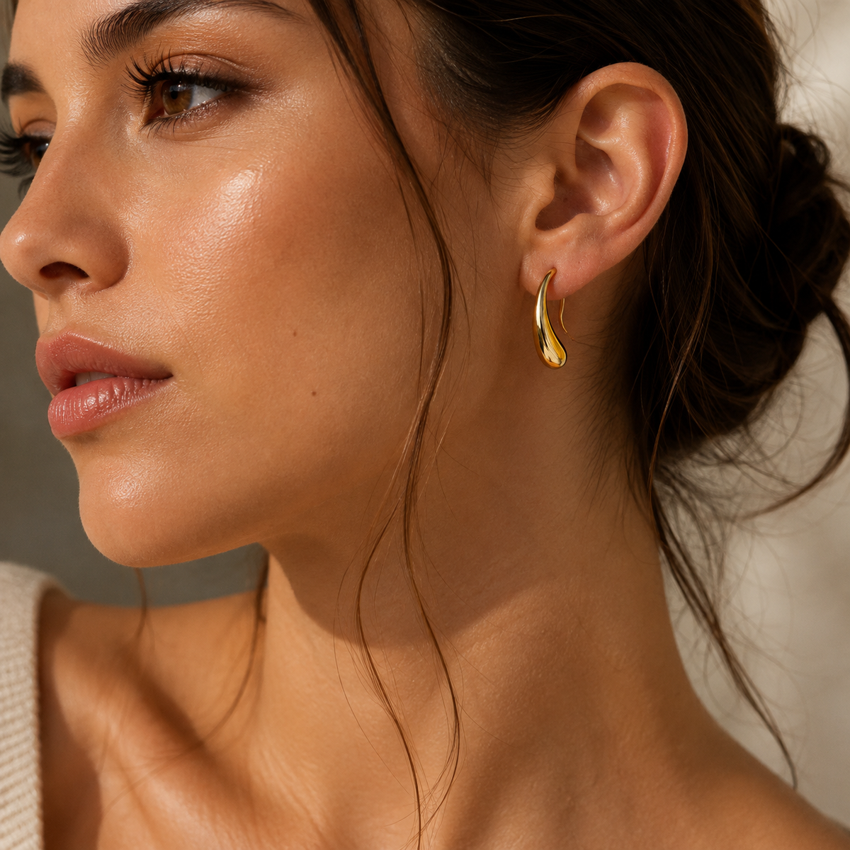 Amara Studs by JouJule sculptural gold-tone drop earrings styled on model