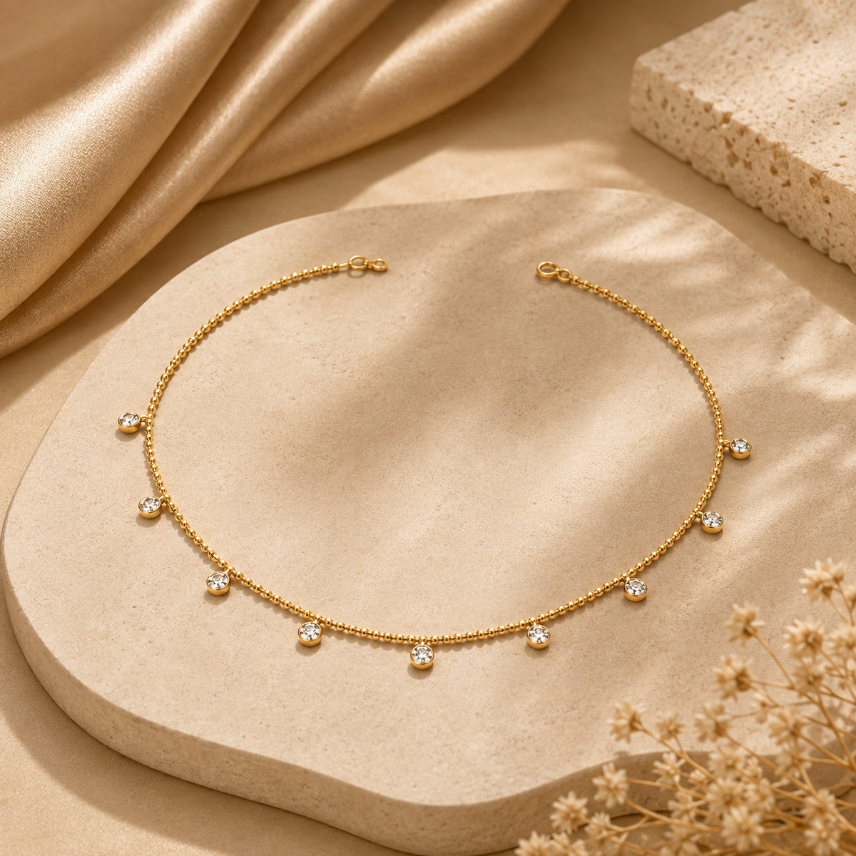 Joū Chain by JouJule gold-tone necklace with evenly spaced crystal-inspired accents