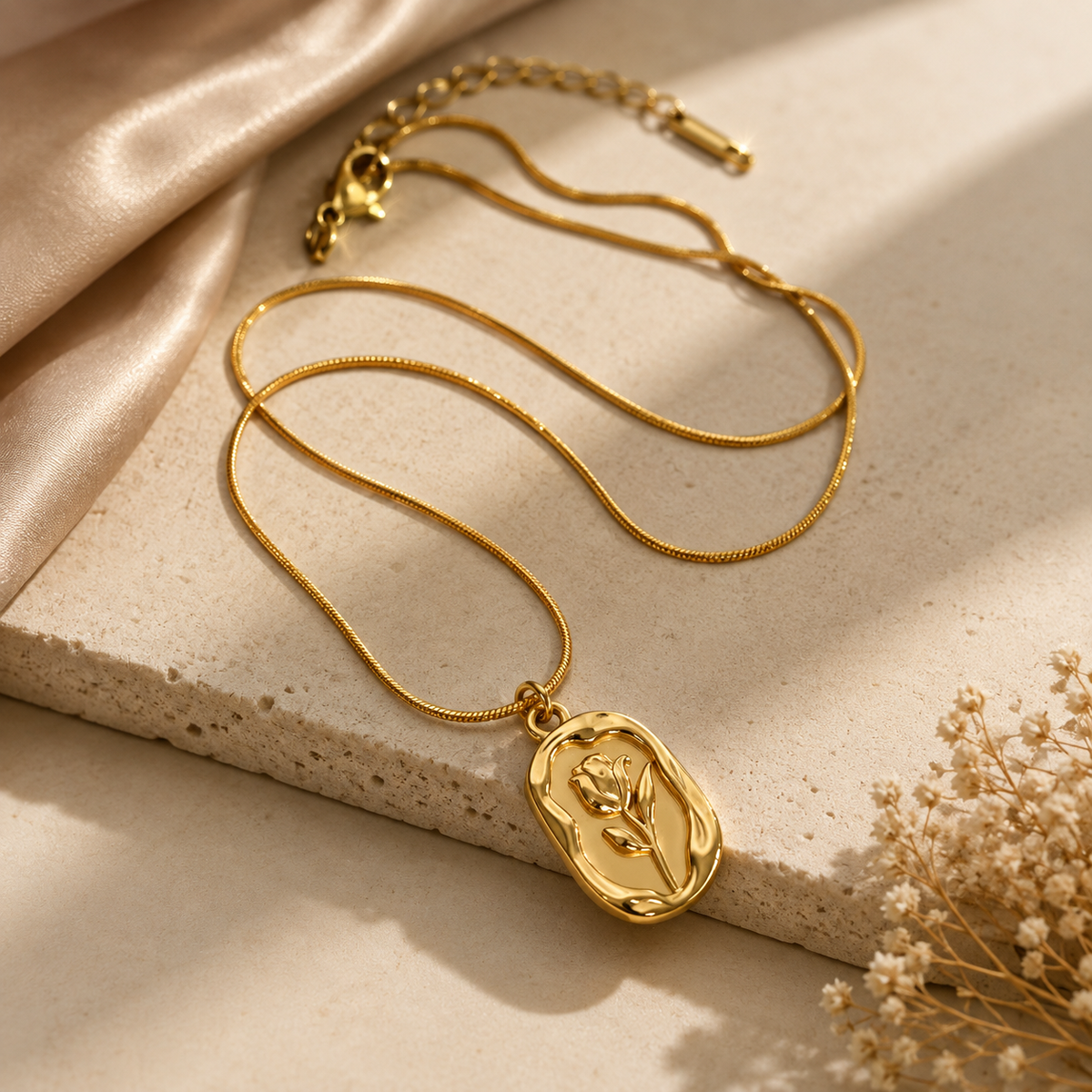 Joū Choker by JouJule featuring a gold-tone chain and sculptural floral pendant