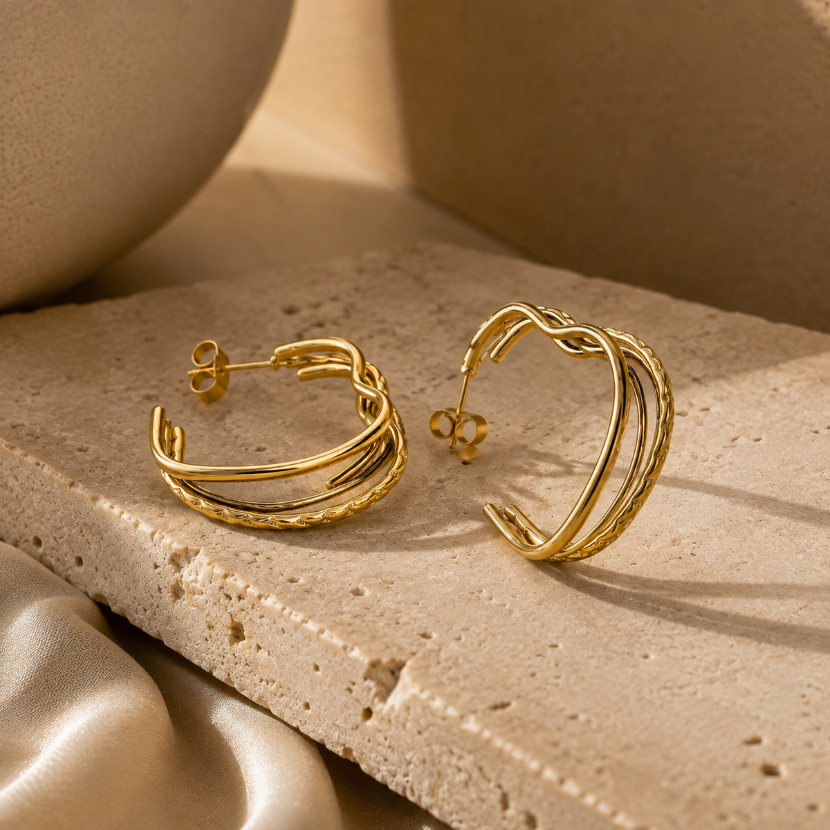 Joū Hoops by JouJule, sculptural gold-tone layered hoop earrings with polished and textured bands