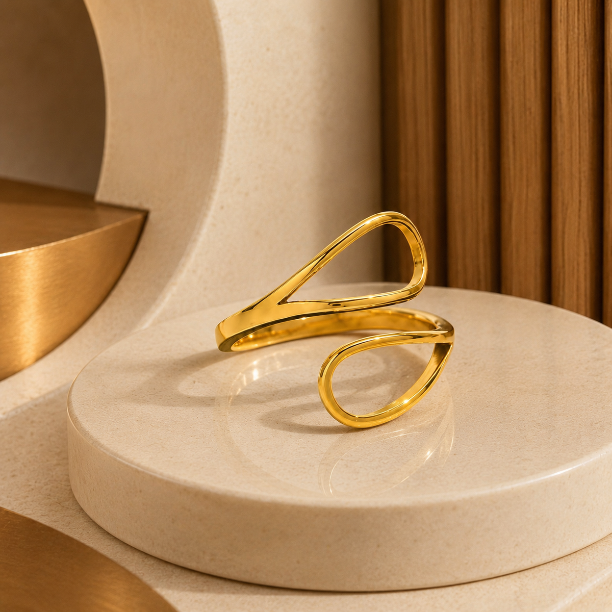 Joū Ring by JouJule, sculptural gold statement ring with a fluid curved design