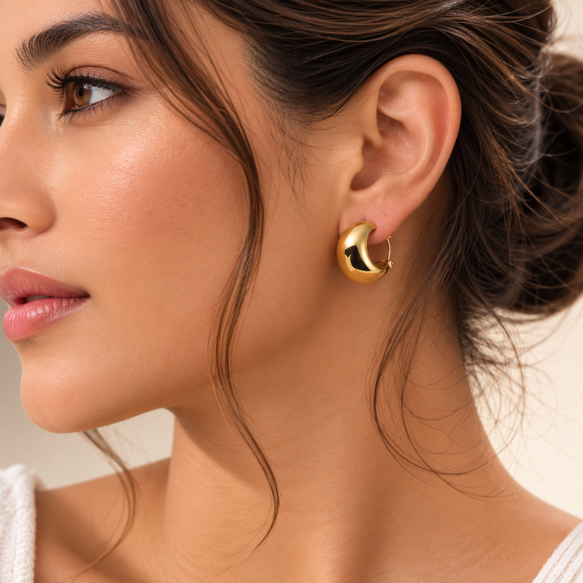 Vesper Studs by JouJule gold-tone rounded statement earrings styled on model